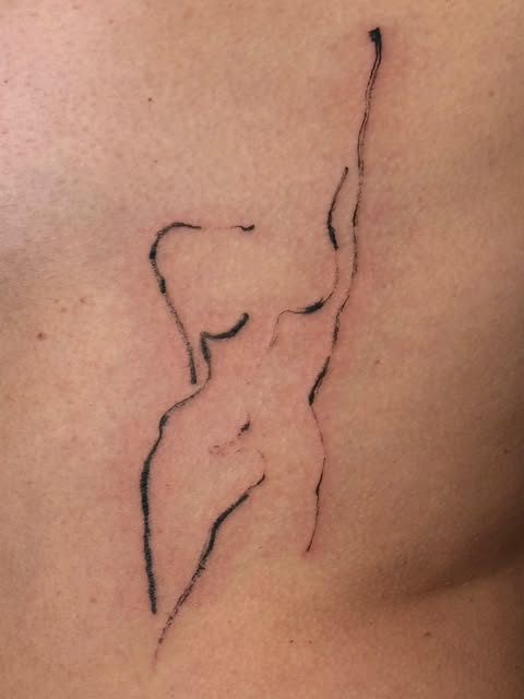 Figure tattoo on back
